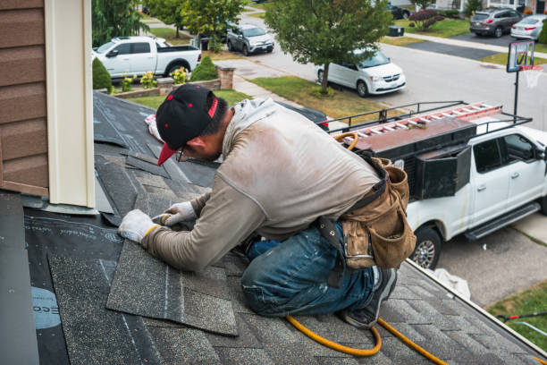 Professional Gutter Repair And Installation technician working in Winsted, CT